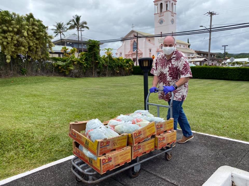 Mayor Roth helping distribute food